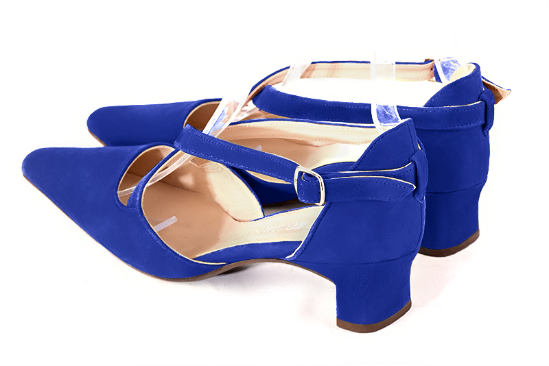 Electric blue women's open side shoes, with crossed straps. Tapered toe. Low kitten heels. Rear view - Florence KOOIJMAN